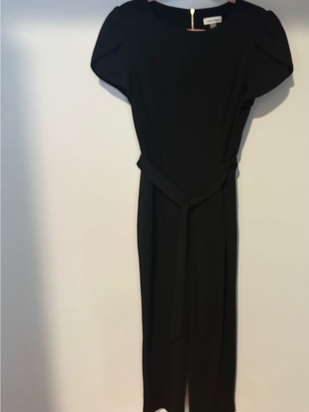 Calvin Klein Classic Black Jumpsuit with back zipper, pockets and cap sleeves